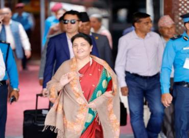 Former President Bhandari returns home from China